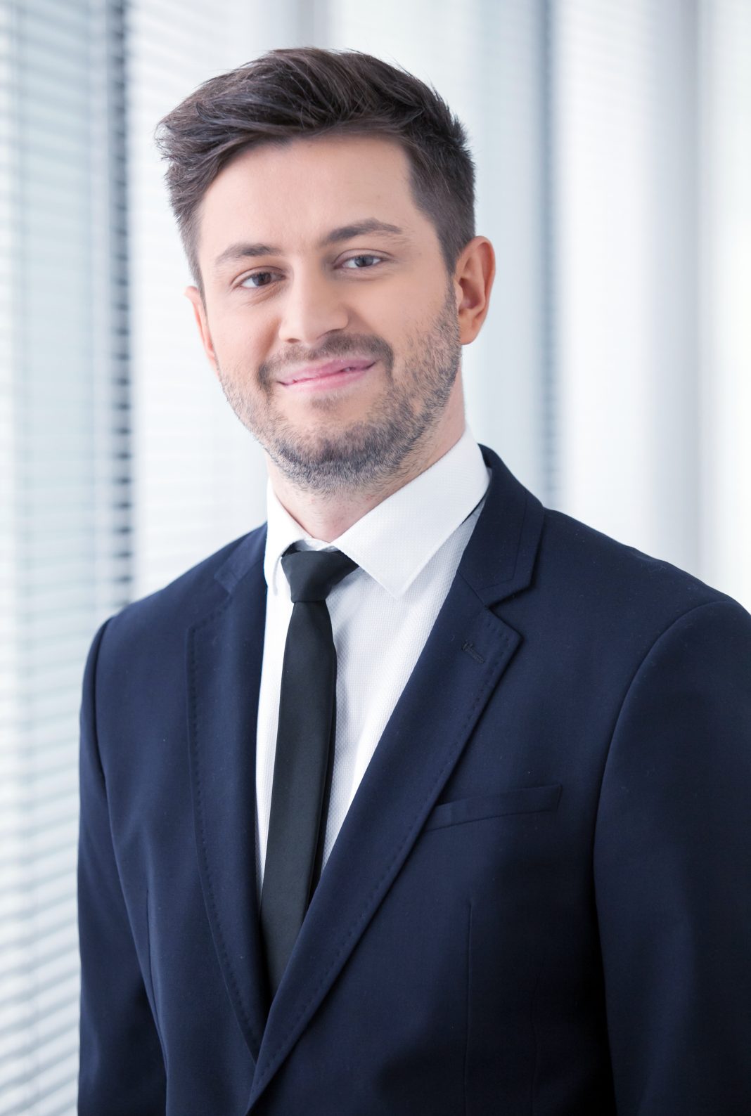 Michał Wachowicz, konsultant w dziale rynków kapitałowych, Cushman & Wakefield