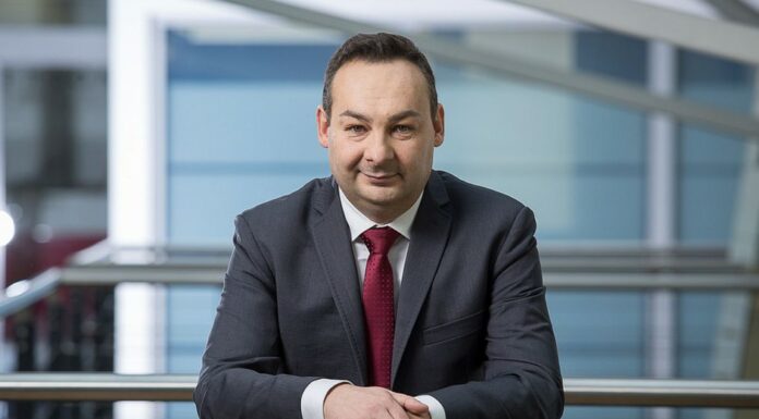 Dariusz Książak, Prezes Emmerson Evaluation